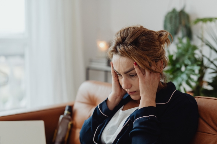 woman sitting alone focus